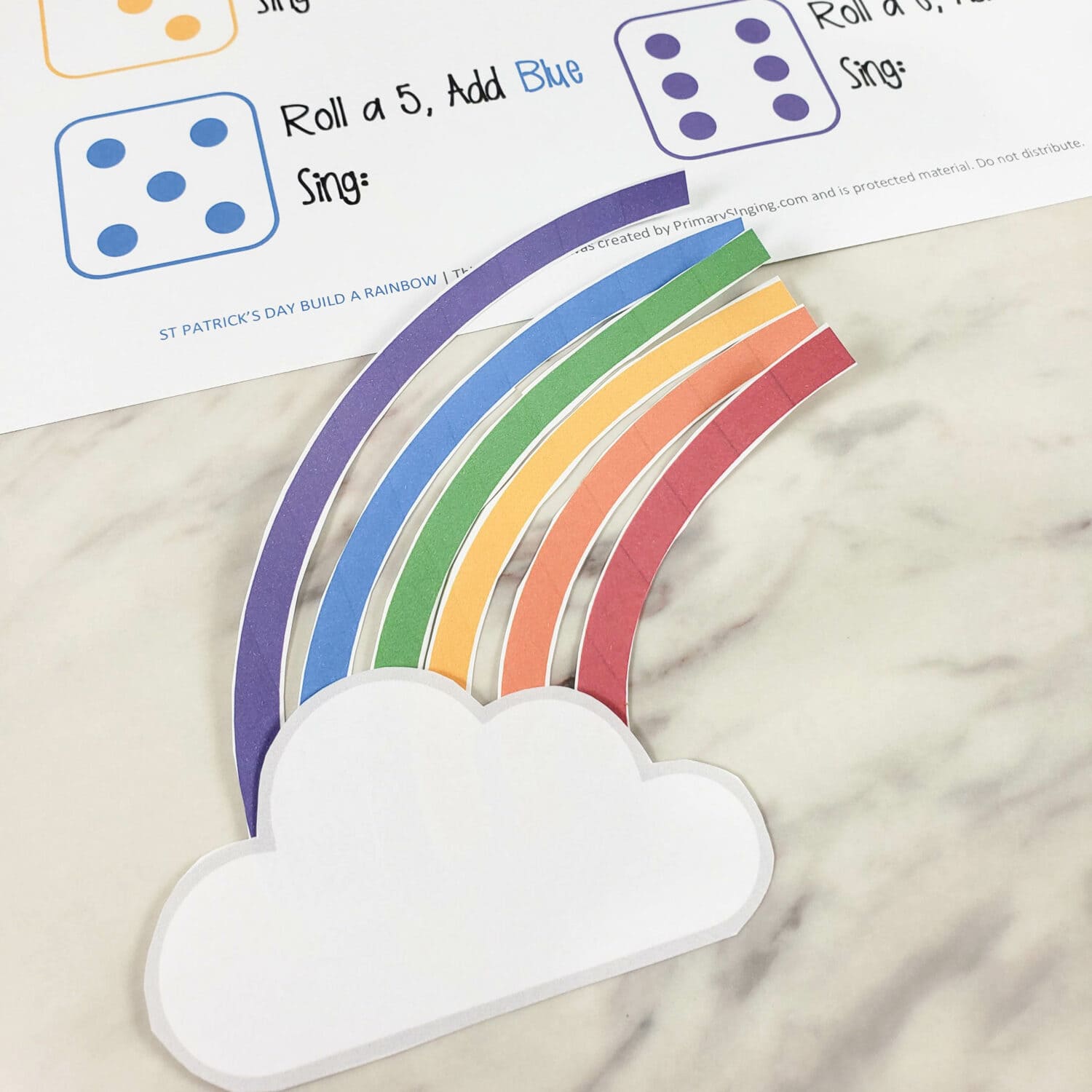 Roll a Rainbow Printable dice game fun for teachers, church, or home use with free printable and fun extension ways to play. Perfect St Patrick's Day activities for kids.