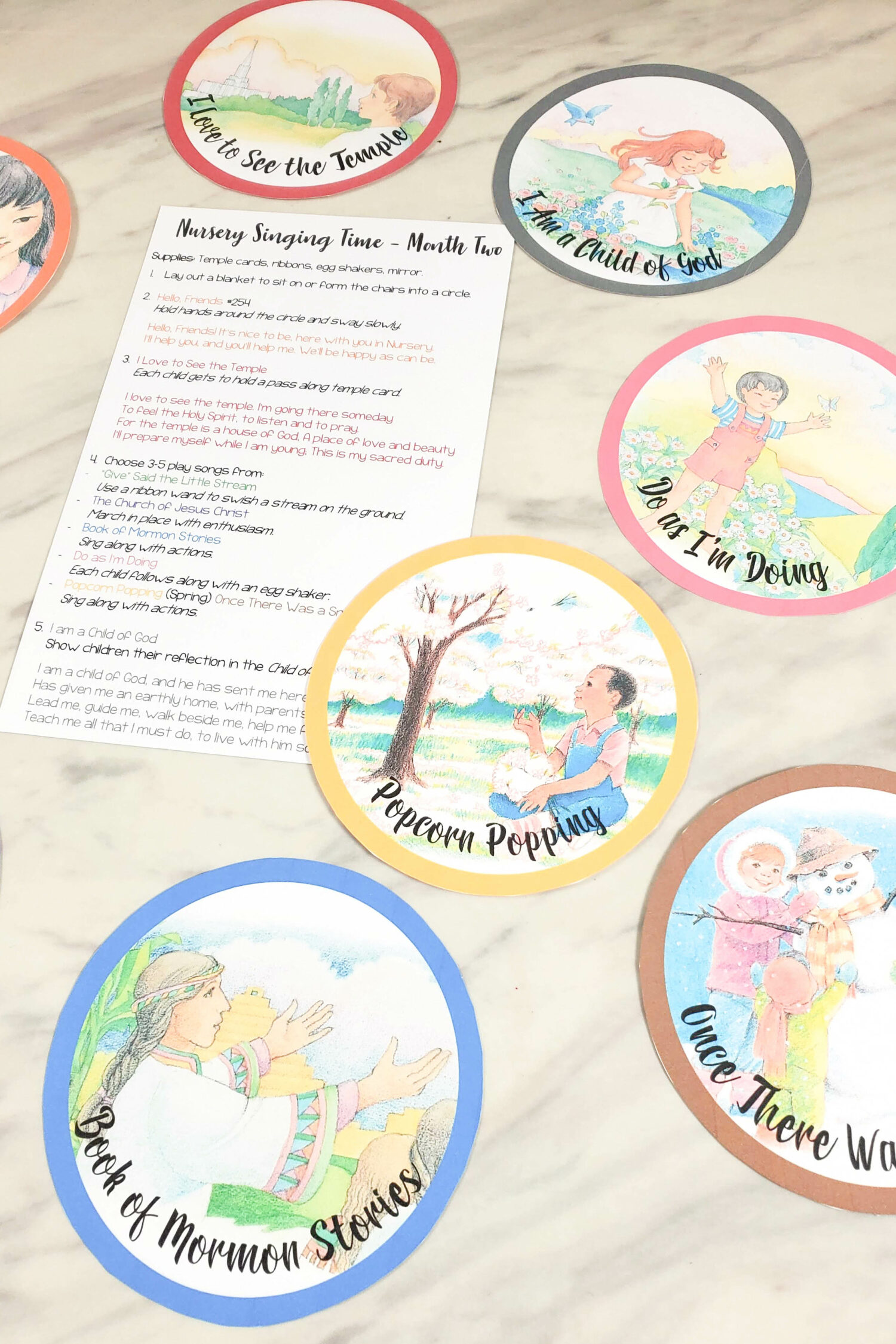 Nursery Singing Time Song Cards - make singing time for your nursery kiddos a breeze with these adorable song selection cards! Plus, a printable schedule with 2 monthly rotatable schedules to get through a variety of songs while keeping consistency.