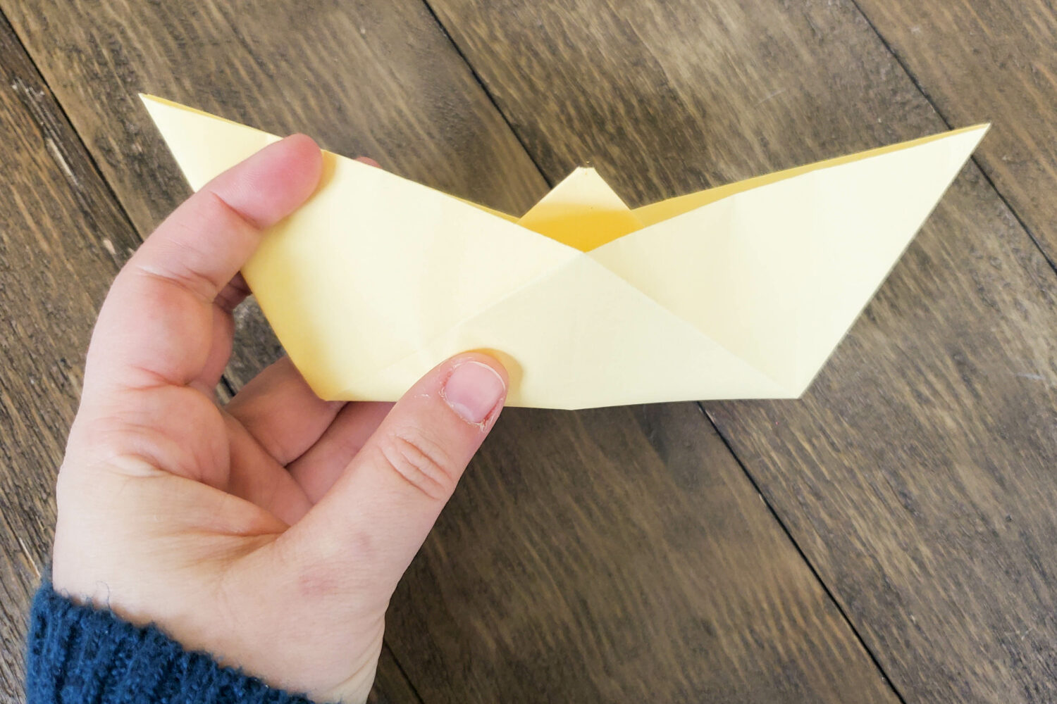 Build an Origami Boat as you teach Nephi's Courage in Singing Time! A great object lesson with lots of singing repetition build in as you learn to do hard things together! Printable song helps for LDS Primary music leaders and families. Step by step directions on how to make an origami boat quick and easy tutorial.