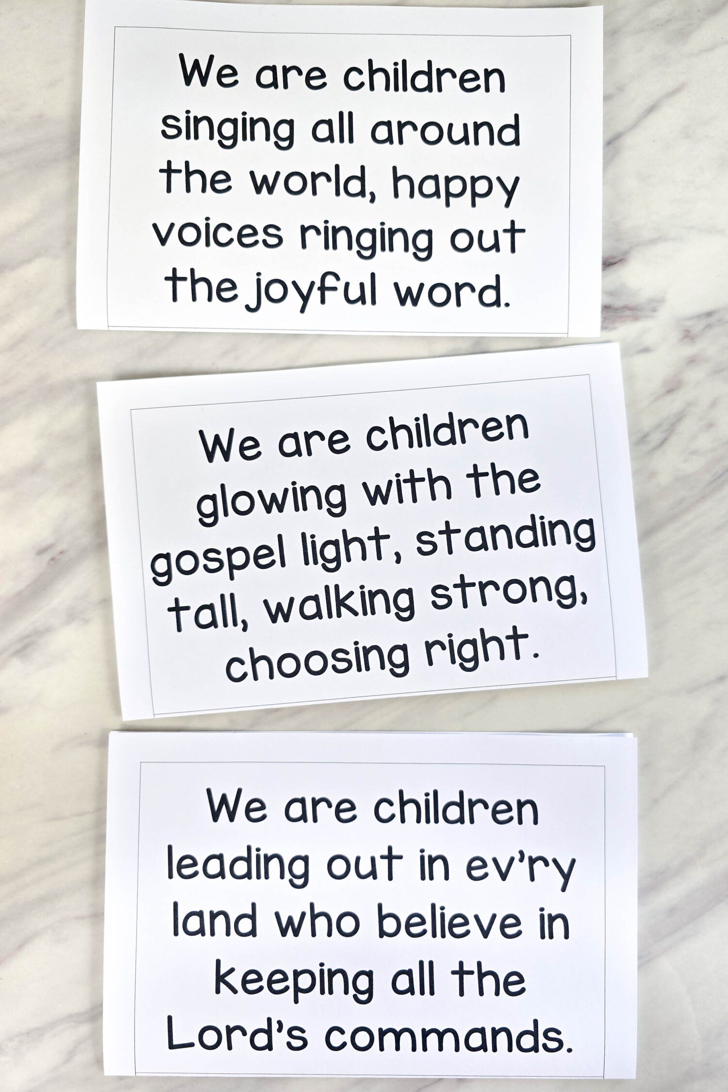 Holding Hands Around the World Picture the Children - Start with the lyrics face up, then flip them over as you go to pictures of children from all over the world! Fun and easy singing time idea and lesson plan for LDS Primary music leaders.