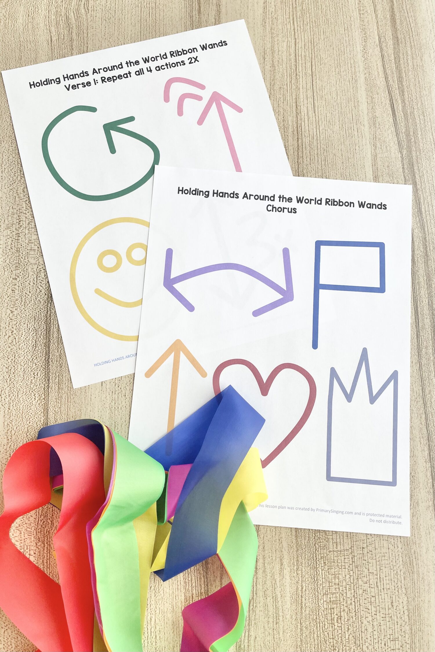 Holding Hands Around the World Ribbon Wands 6 Holding Hands Around the World Ribbon Wands - Follow this fun & easy ribbon wands pattern for an engaging singing time idea with printable song helps for LDS Primary Music Leaders.